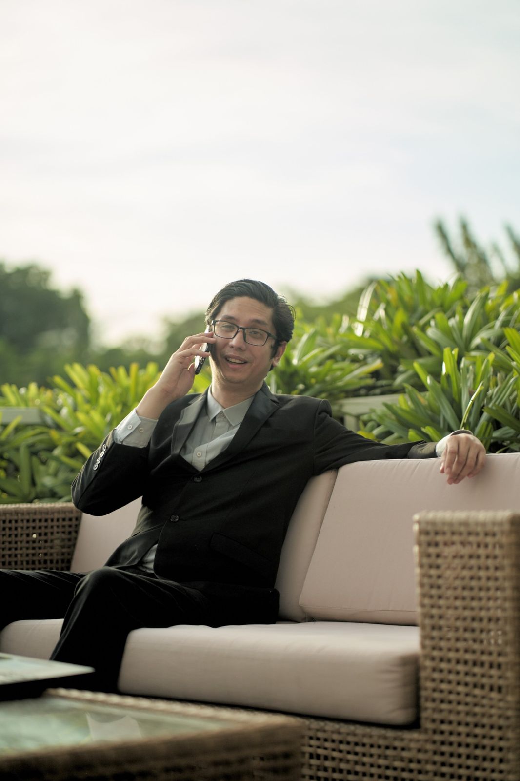 Maj Custodio on a call with a client